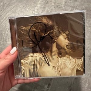 SOLD - NEW SEALED SIGNED FEARLESS TAYLORS VERSION CD